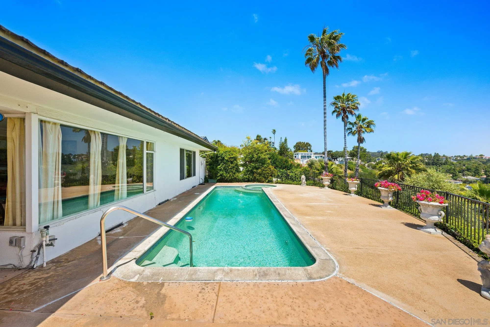 5903 Soledad Mountain Road La Jolla, CA 92037 - Photo 33 of 44 a view of swimming pool with a patio
