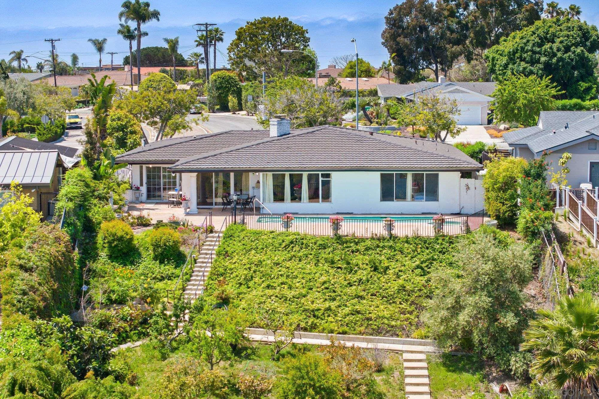 5903 Soledad Mountain Road La Jolla, CA 92037 - Photo 44 of 44 a aerial view of a house with garden space and a lake view