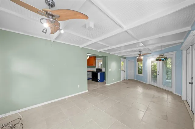 a kitchen with granite countertop a sink and cabinets
