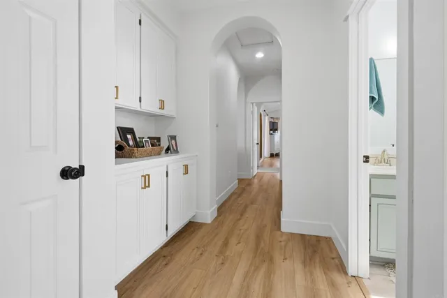 a view of a kitchen from the hallway