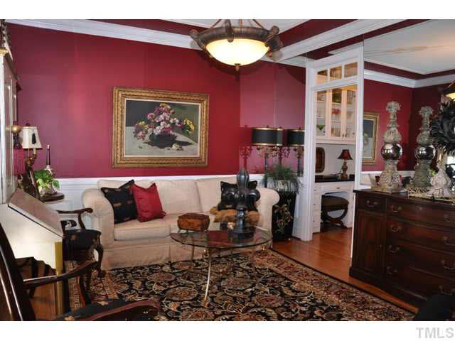 8904 Windjammer Drive Raleigh, NC 27615 - Photo 5 of 25 Heavy moldings, hardwood floors and plantation shutters are only a few of the many details in store for a lucky new owner! Don't need a formal living room? Great! This room would also make the perfect study! Living Room