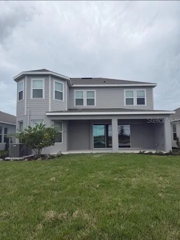 a house that has a lot of plants in it