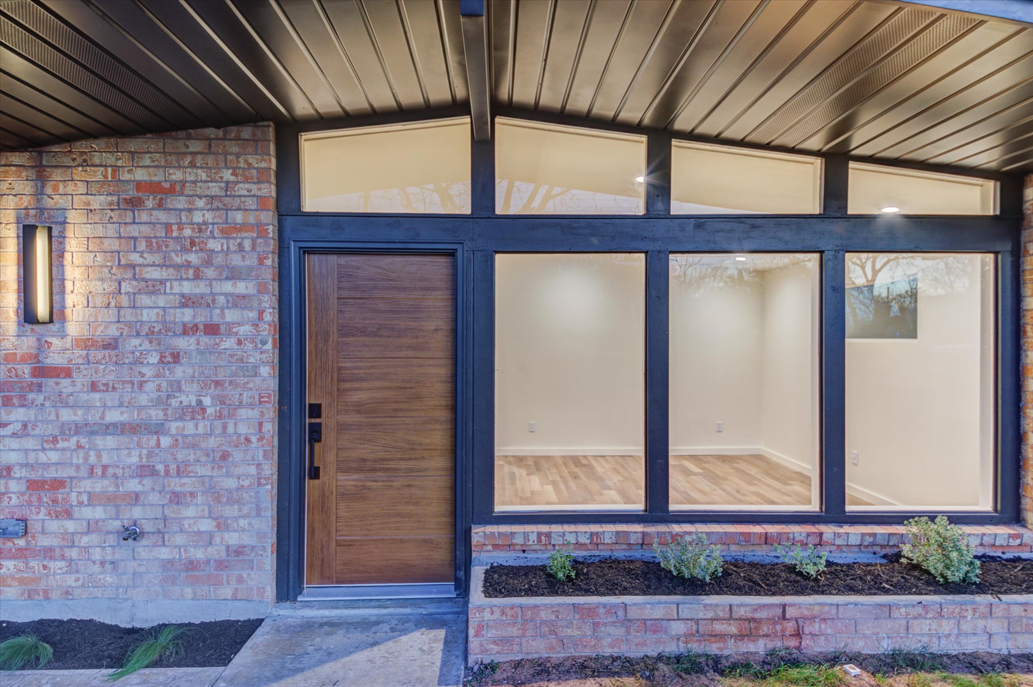 1719 Meander Drive Austin, TX 78721 - Photo 2 of 29 All new windows/doors, roof, plumbing, electrical, HVAC -- while maintaining original features like vaulted ceilings, all sides brick and oversized MCM picture/clerestory windows. See Upgrades List in Documents!