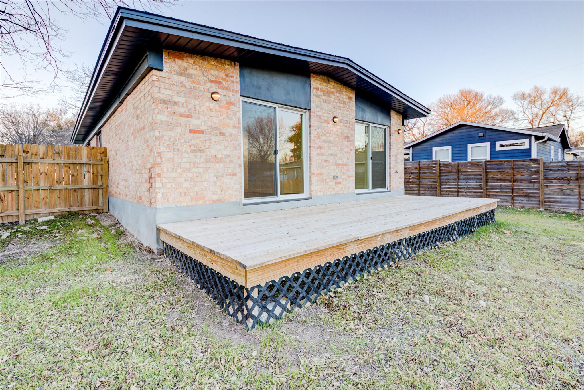 1719 Meander Drive Austin, TX 78721 - Photo 21 of 29 a front view of a house with a yard