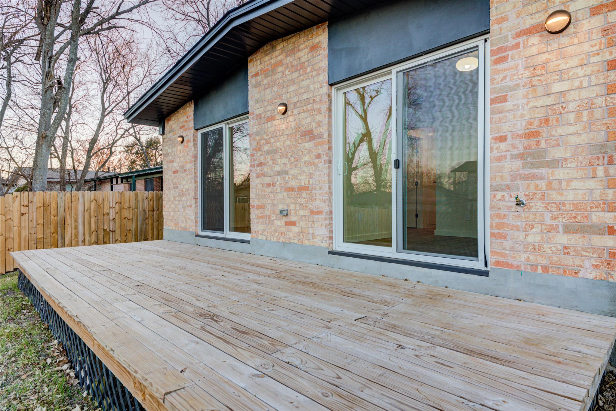 1719 Meander Drive Austin, TX 78721 - Photo 22 of 29 a view of a brick house with a wooden floor