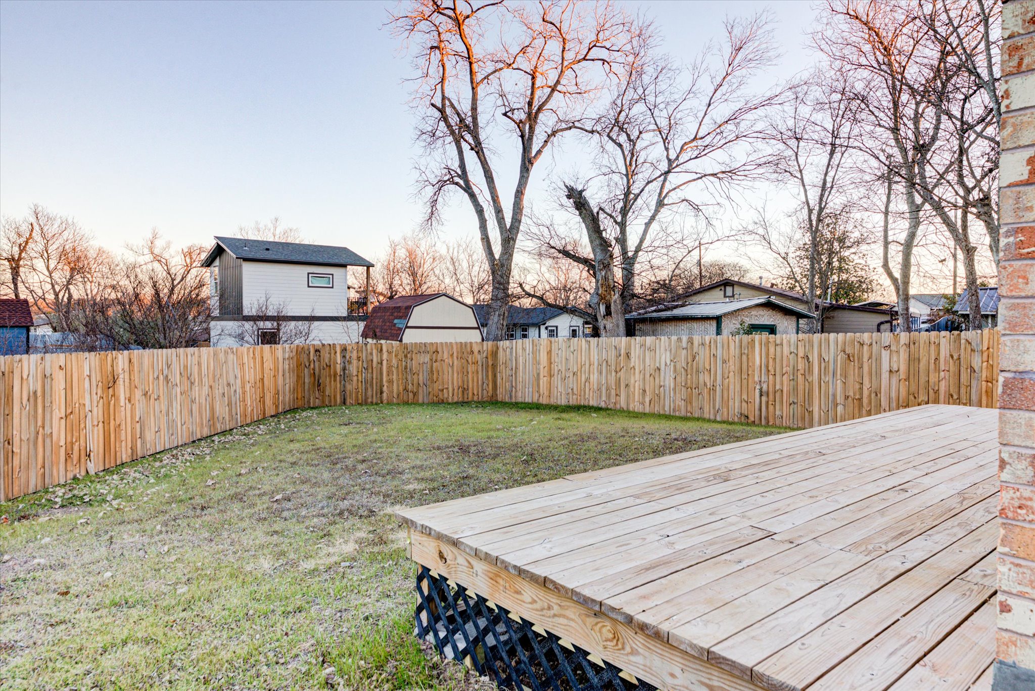 1719 Meander Drive Austin, TX 78721 - Photo 27 of 29 a view of a backyard with wooden fence
