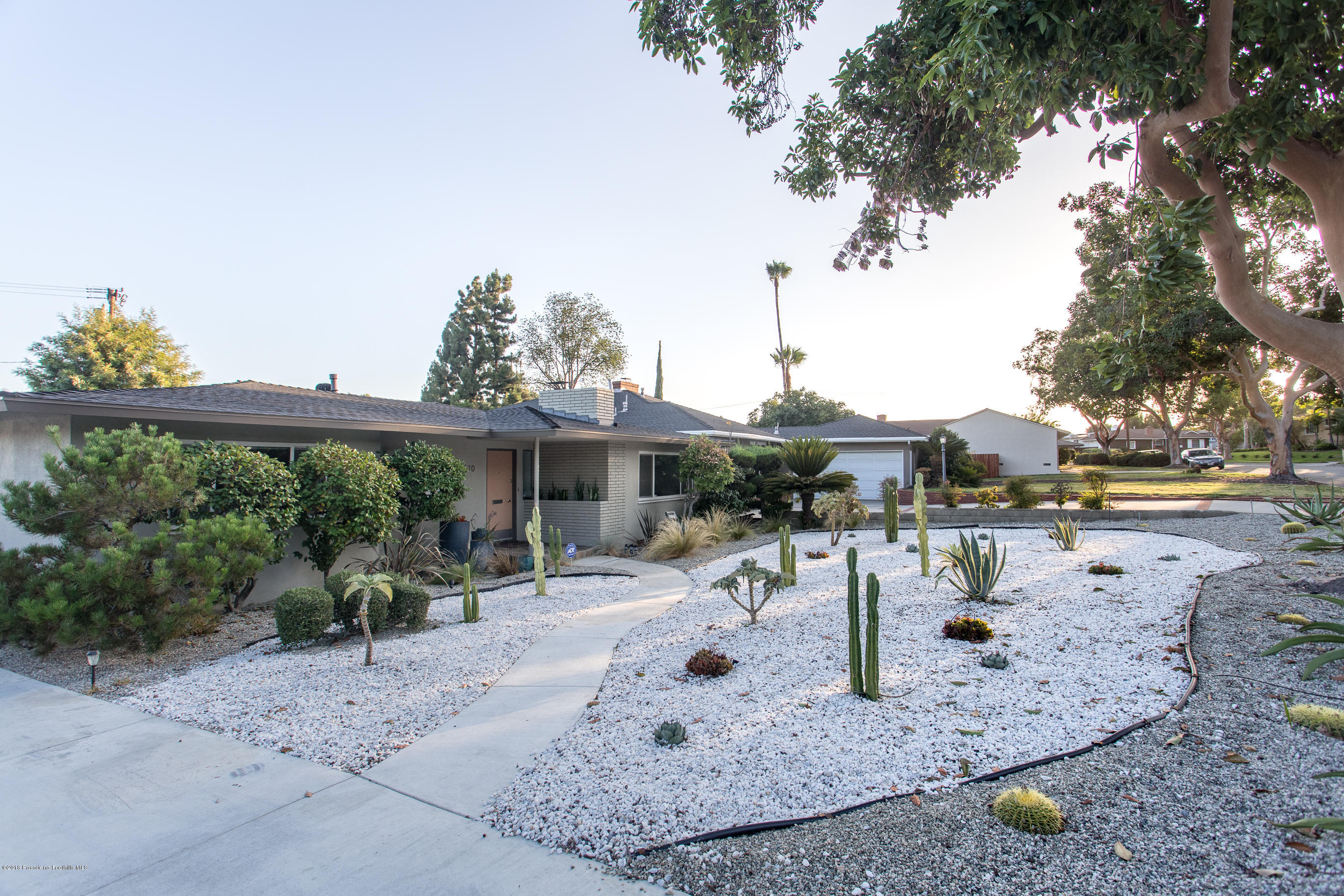 3610 Hampton Road Pasadena, CA 91107 - Photo 17 of 27 a view of a swimming pool with a patio
