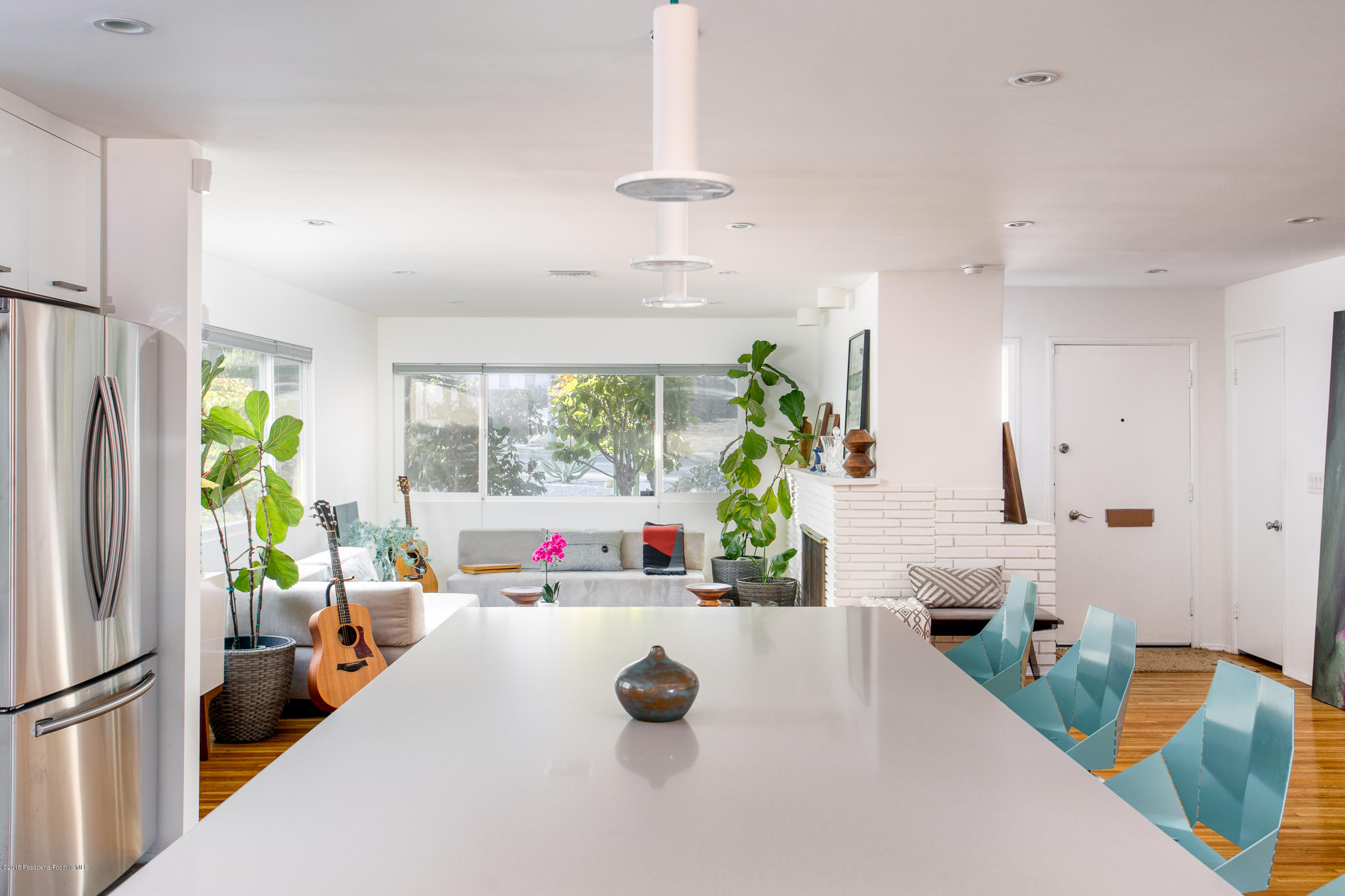 3610 Hampton Road Pasadena, CA 91107 - Photo 4 of 27 a living room with furniture and a chandelier