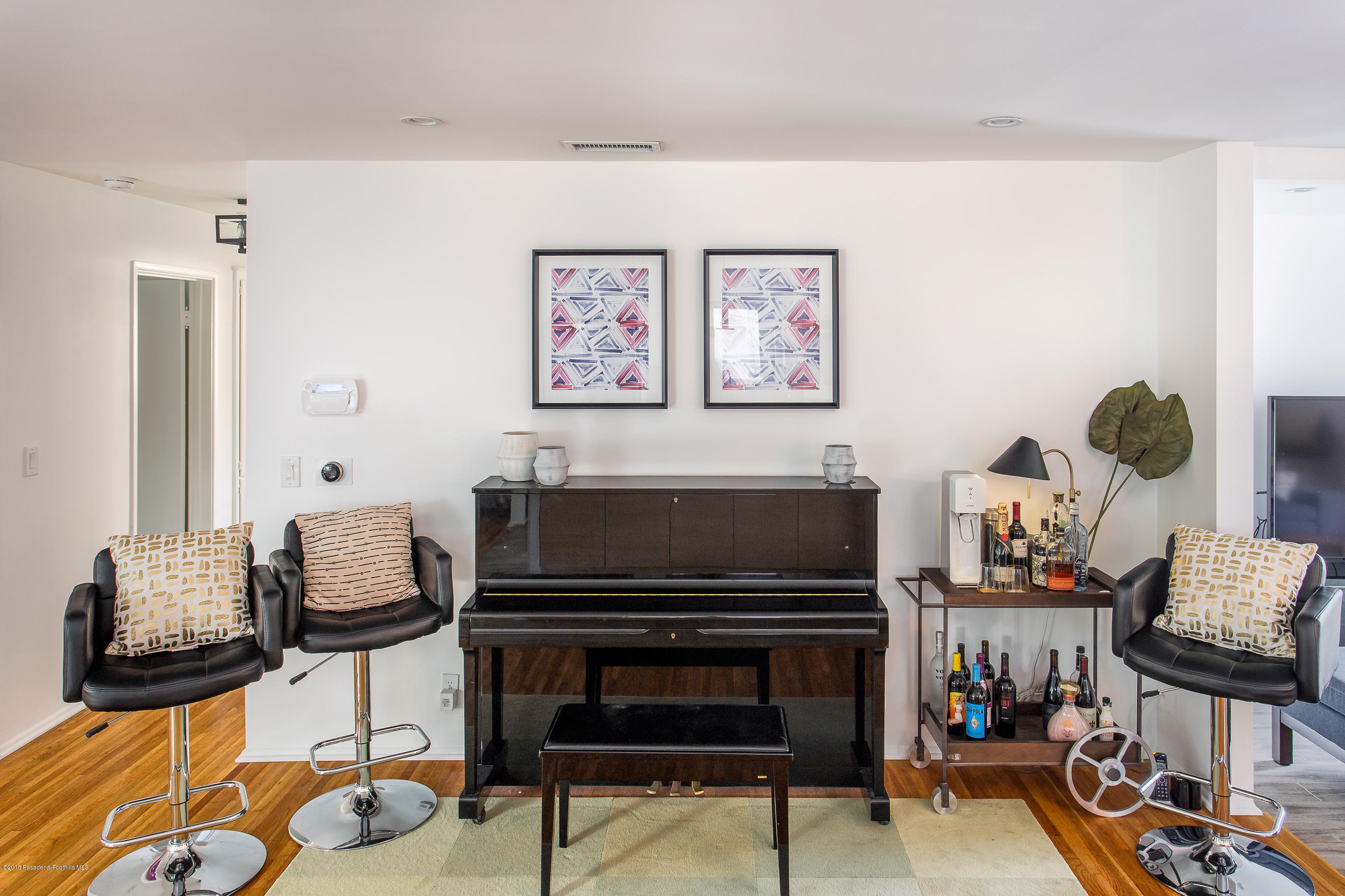 3610 Hampton Road Pasadena, CA 91107 - Photo 7 of 27 a living room with furniture and a fireplace