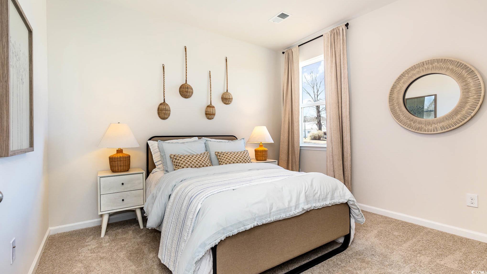 109 Homestead Way Myrtle Beach, SC 29588 - Photo 21 of 22 Bedroom featuring light carpet