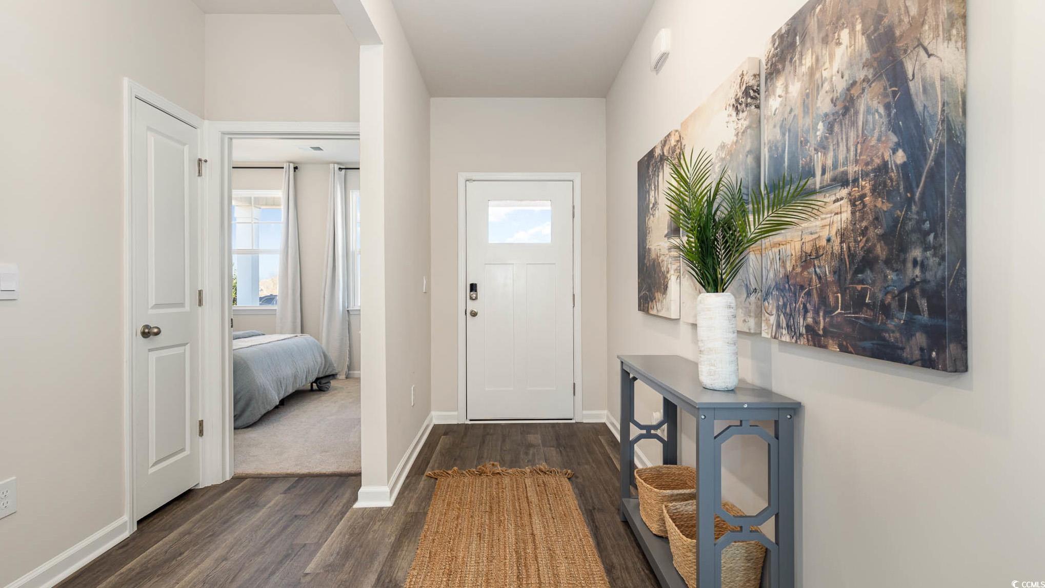 109 Homestead Way Myrtle Beach, SC 29588 - Photo 3 of 22 Doorway with wood finished floors and baseboards