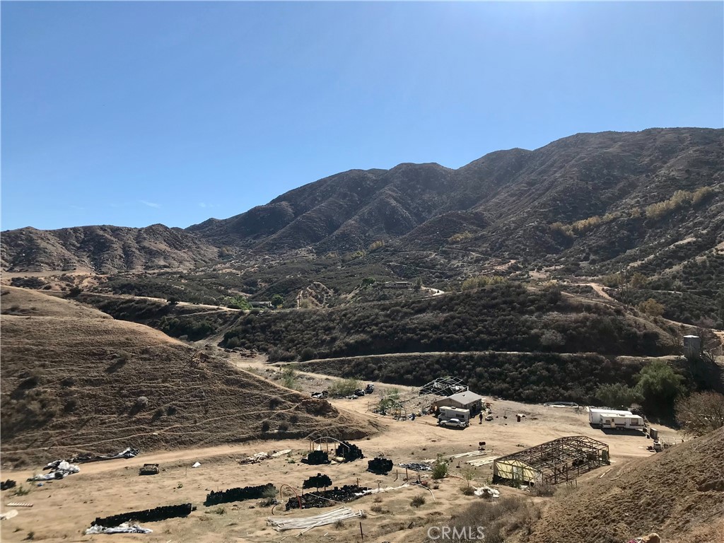 7840 Reche Canyon Road Colton, CA 92324 - Photo 3 of 20 a view of a backyard of a house