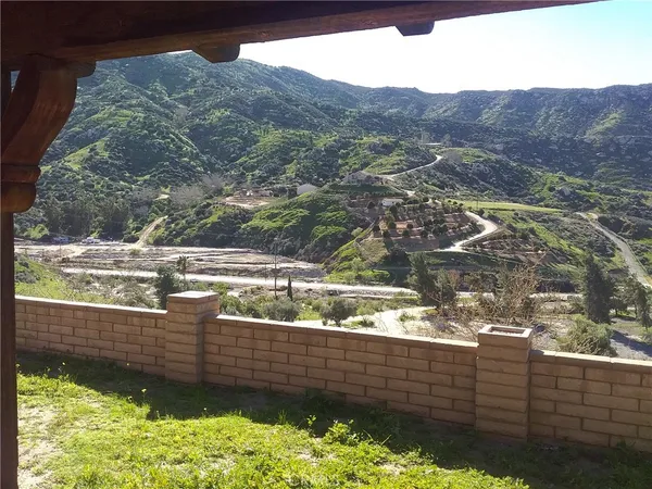 a view of a lake from a balcony