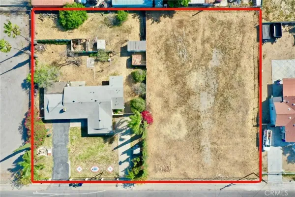 an aerial view of residential houses and city view