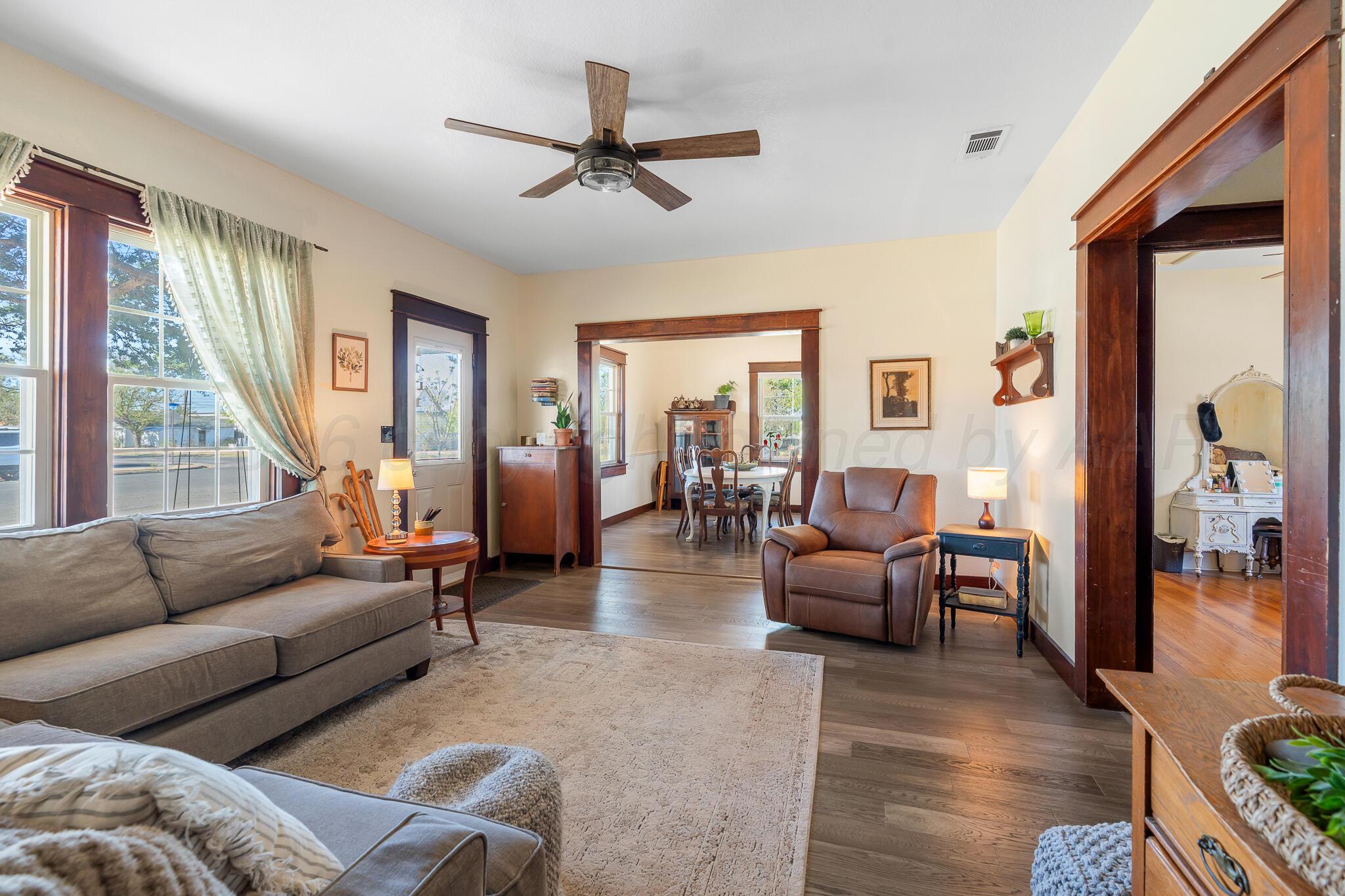 1401 3rd Avenue Canyon, TX 79015 - Photo 6 of 40 a living room with furniture and a large window