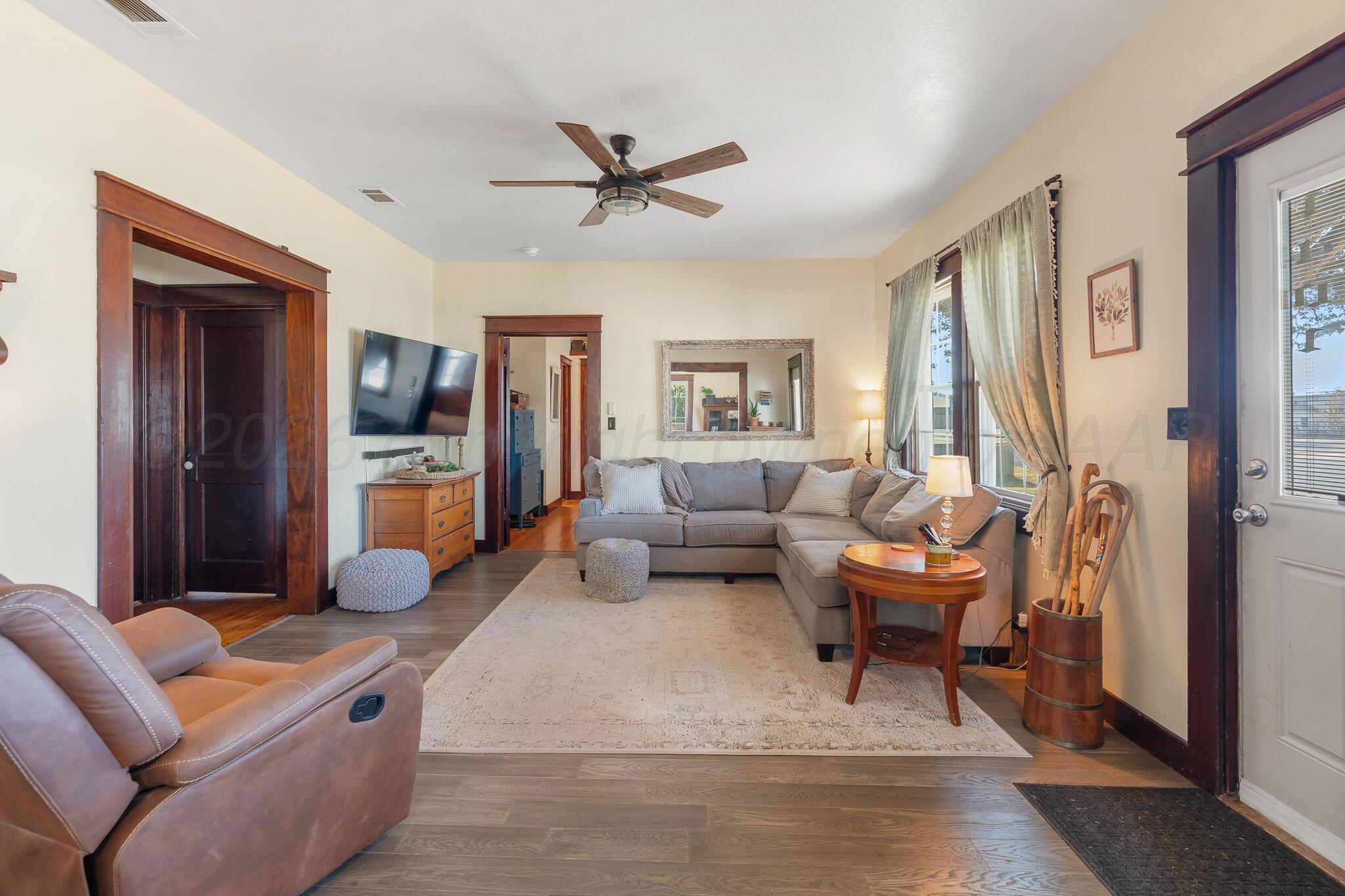 1401 3rd Avenue Canyon, TX 79015 - Photo 8 of 40 a living room with furniture and a window