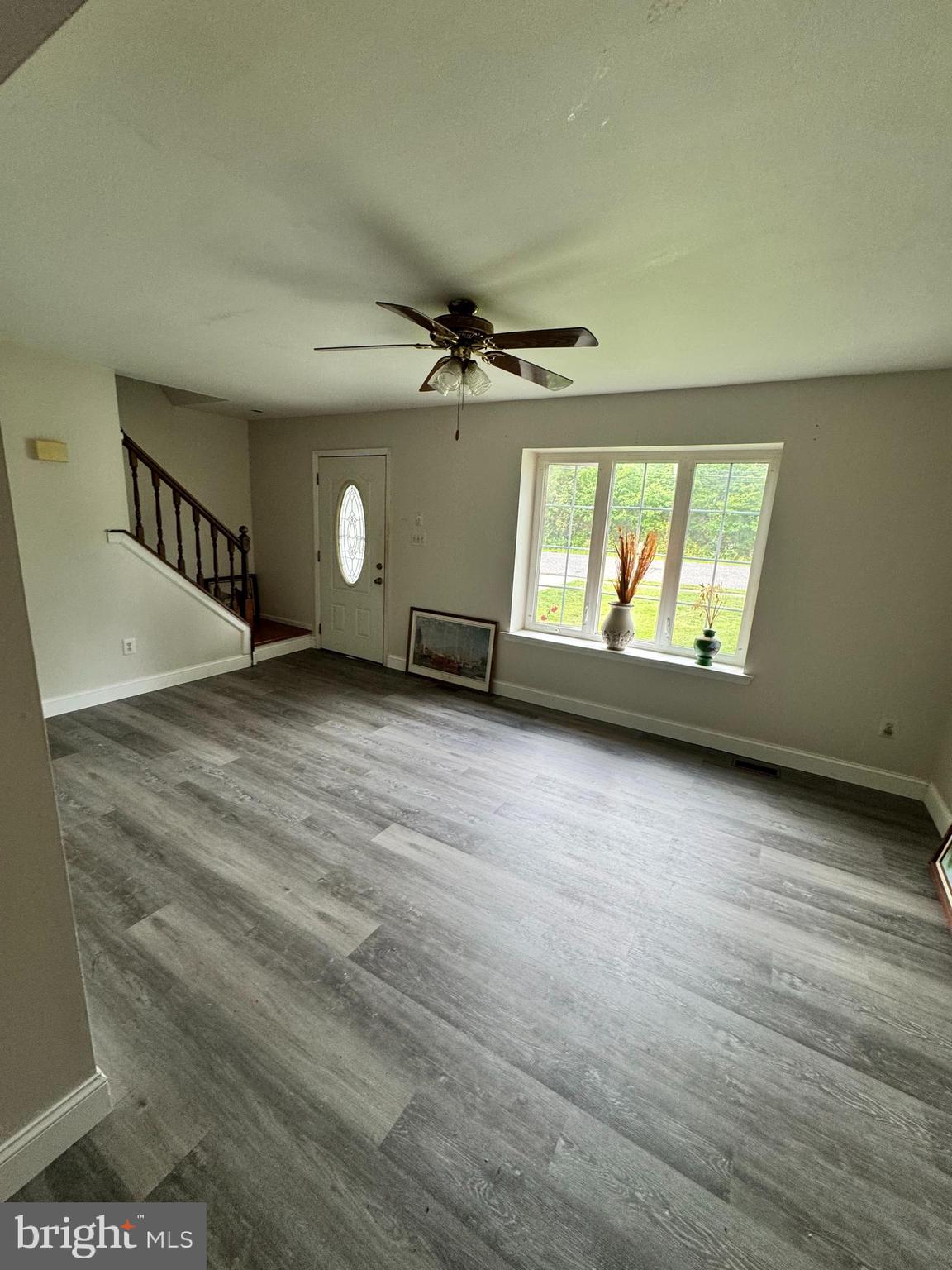 461 Old Erial Road Sicklerville, NJ 08081 - Photo 15 of 34 wooden floor in an empty room with a window