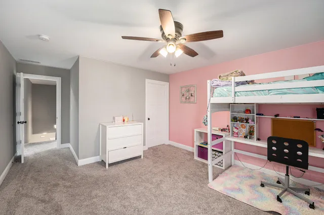 a living room with furniture and decor