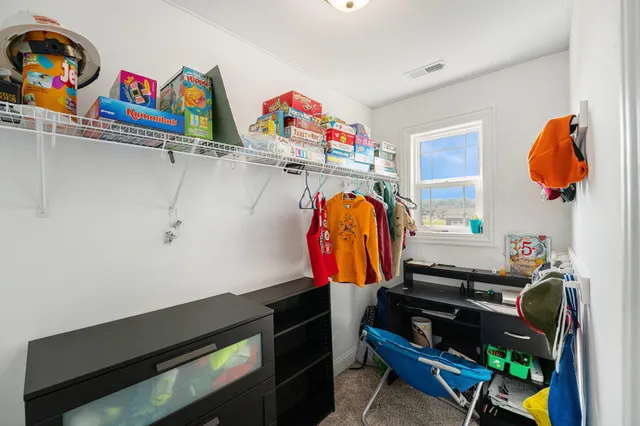 a room with toys and stairs