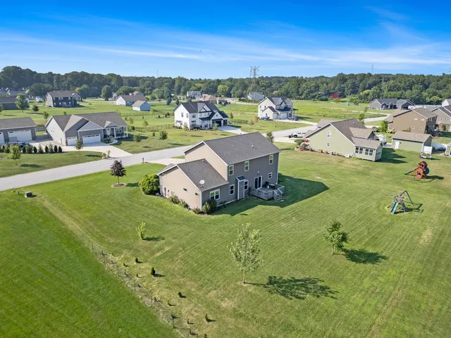 a view of a lake with a yard