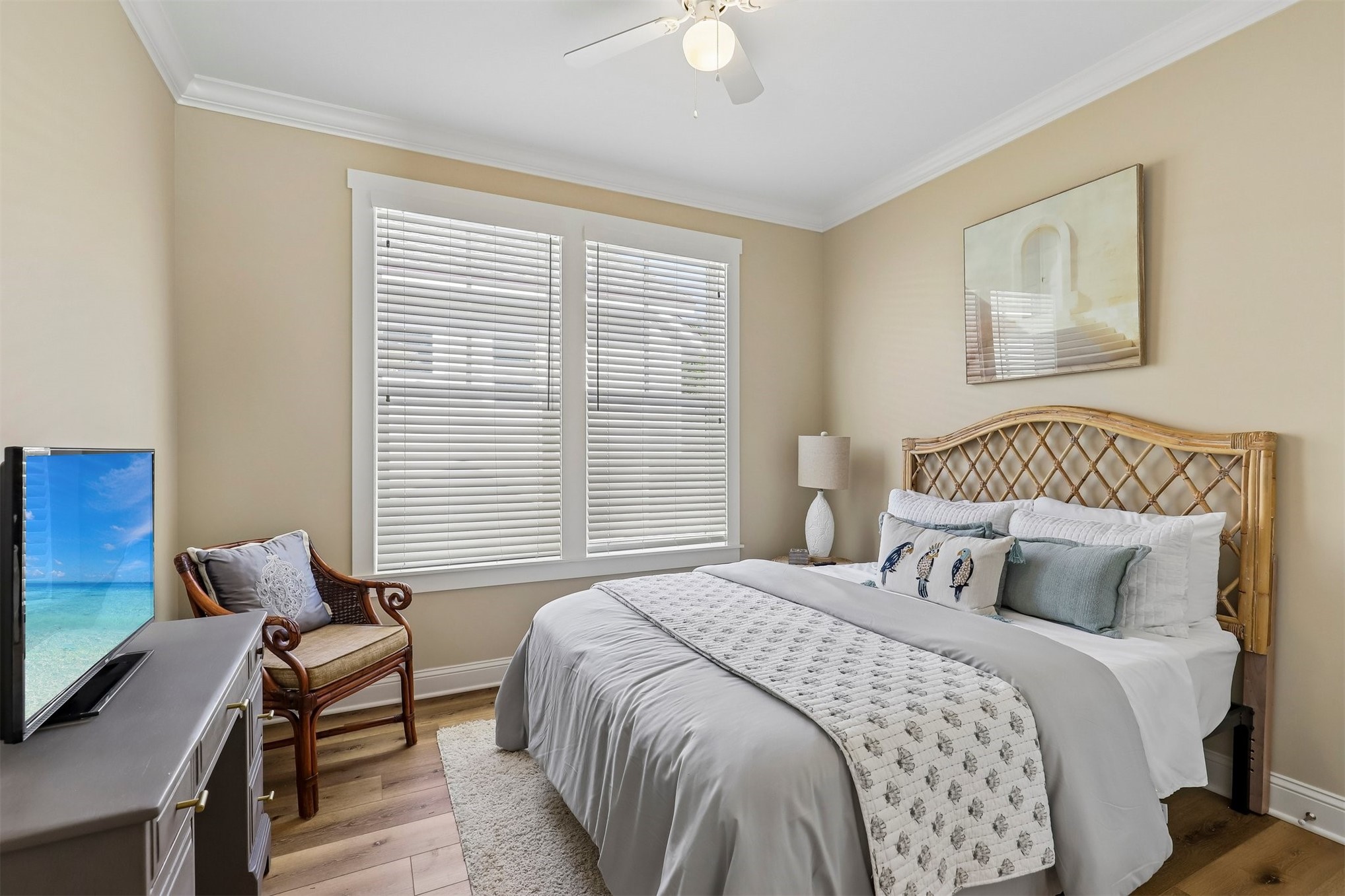1012 White Street Fernandina Beach, FL 32034 - Photo 30 of 35 a bedroom with a bed and wooden floor