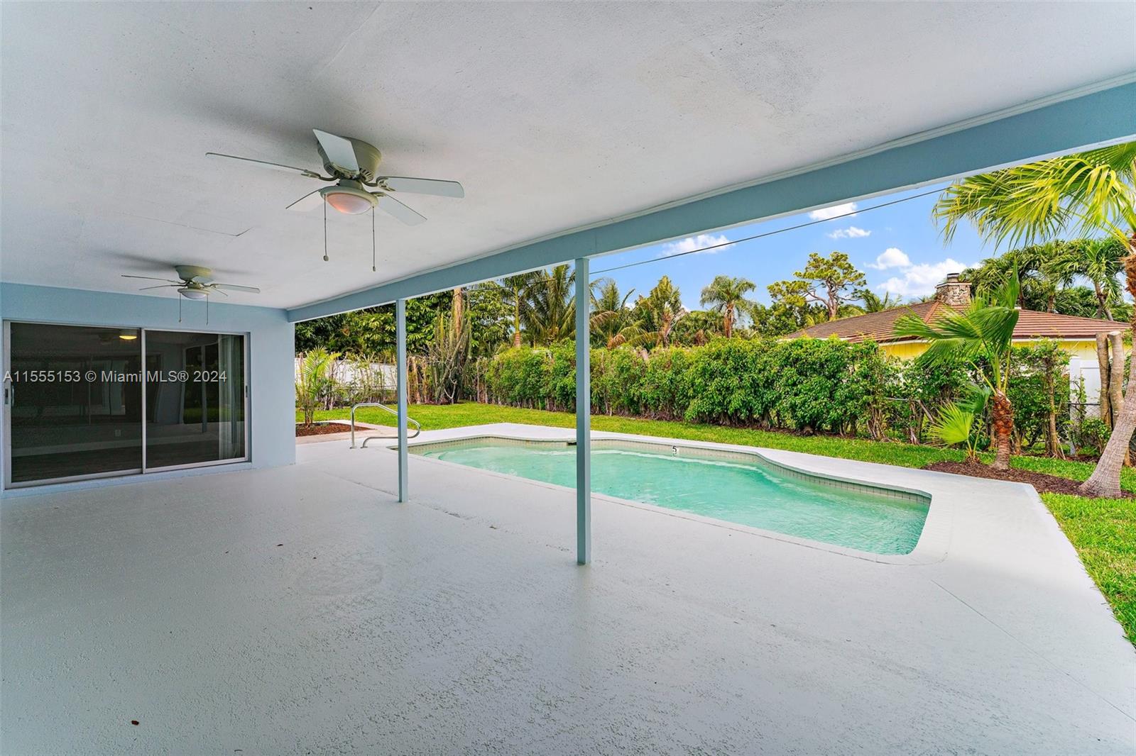 538 Dover Road Tequesta, FL 33469 - Photo 39 of 63 a view of a garden with an outdoor space