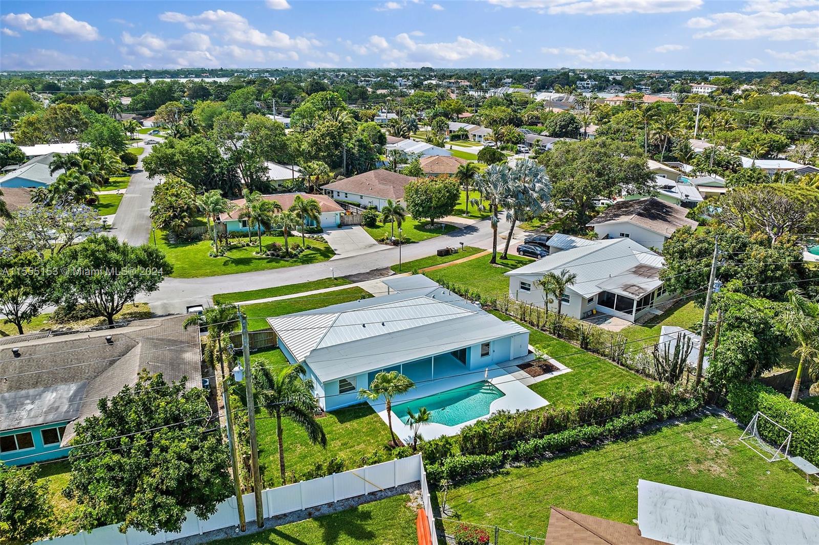 538 Dover Road Tequesta, FL 33469 - Photo 49 of 63 an aerial view of a house with a garden
