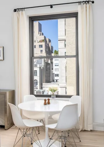 a bathroom with a tub and shower
