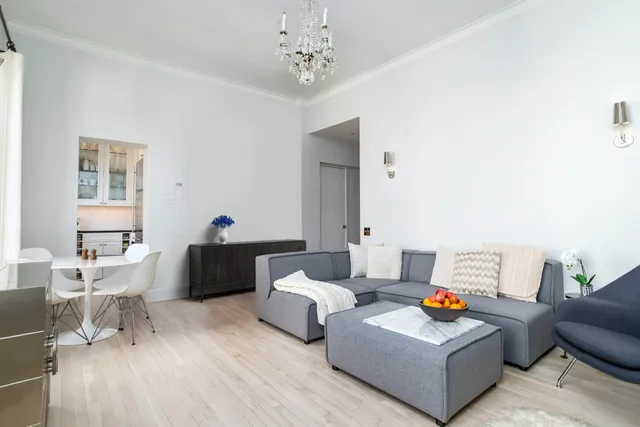 a kitchen with granite countertop a sink and a window