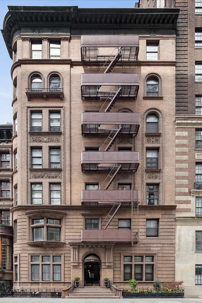 55 East 65th Street, Unit 7A Manhattan, NY 10065 - Photo 16 of 18 a front view of a building with parking space