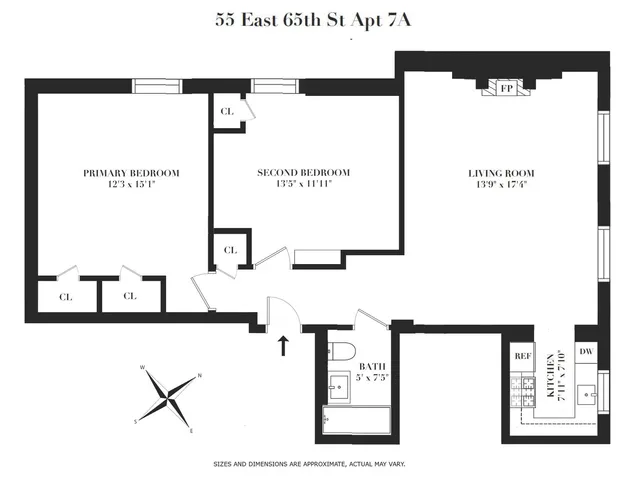 a front view of a house with potted plants