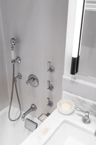 a bathroom with a sink a toilet and a bathtub