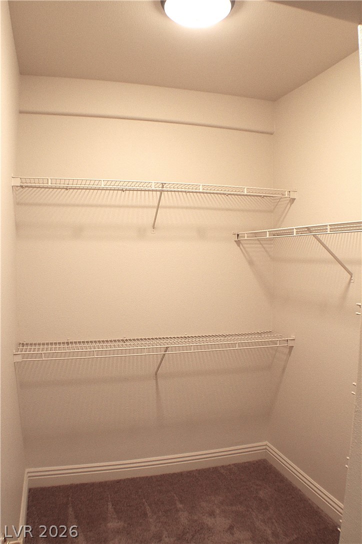 1531 Ruby Cliffs Lane, Unit 102 Las Vegas, NV 89144 - Photo 18 of 30 PRIMARY BEDROOM WALK-IN CLOSET!