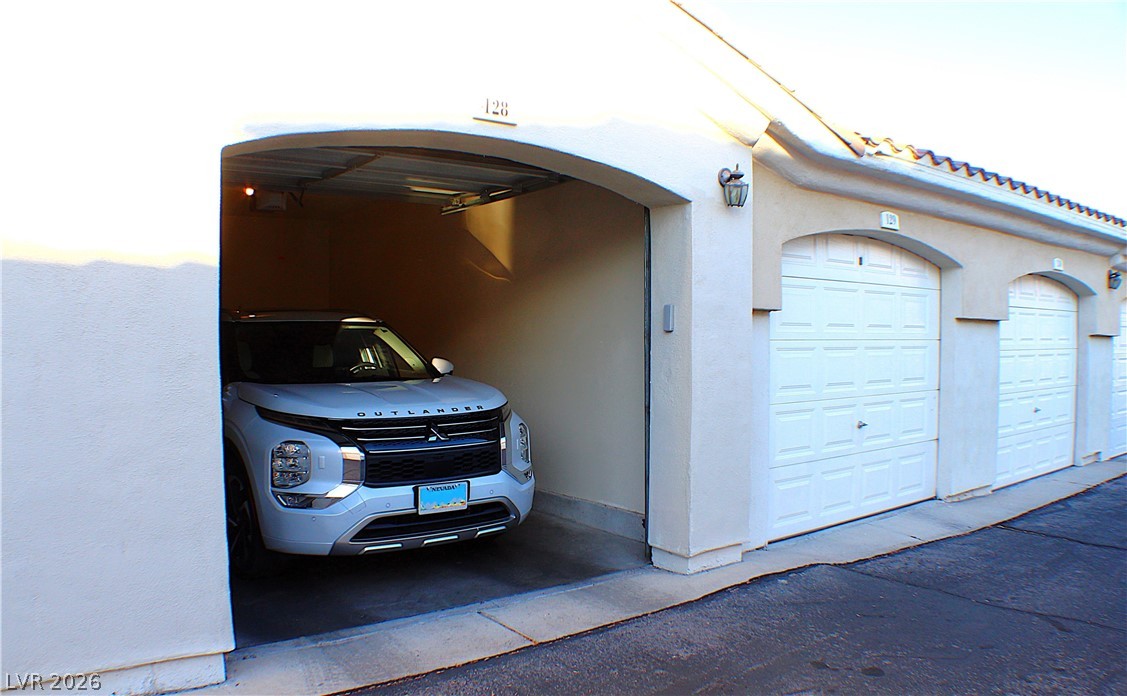 1531 Ruby Cliffs Lane, Unit 102 Las Vegas, NV 89144 - Photo 21 of 30 GARAGE FITS MIDSIZE SUV!