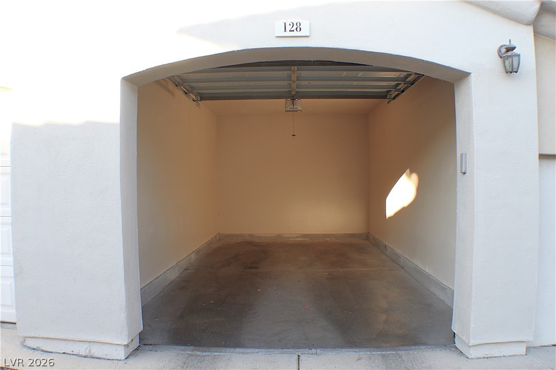 1531 Ruby Cliffs Lane, Unit 102 Las Vegas, NV 89144 - Photo 22 of 30 SUPER CLEAN GARAGE WITH AUTOMATIC DOOR OPENER!