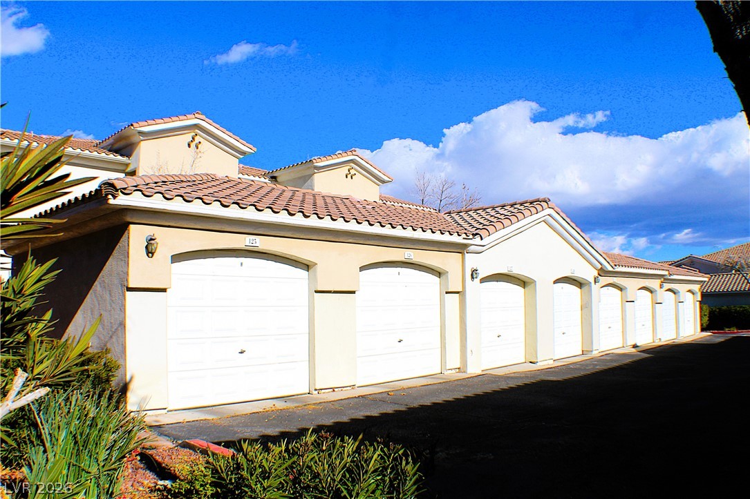1531 Ruby Cliffs Lane, Unit 102 Las Vegas, NV 89144 - Photo 3 of 30 1 CAR DETACHED GARAGE!