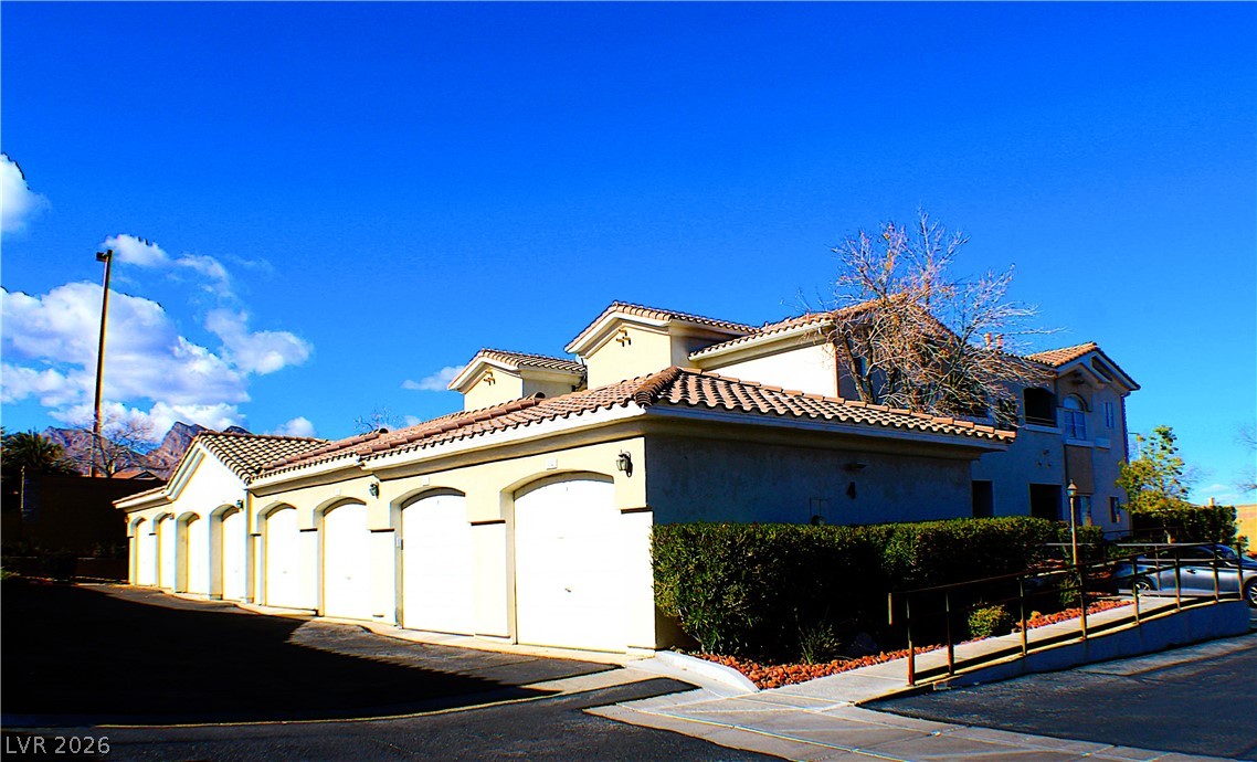 1531 Ruby Cliffs Lane, Unit 102 Las Vegas, NV 89144 - Photo 4 of 30 GARAGE SITS ADJACENT TO CONDO!