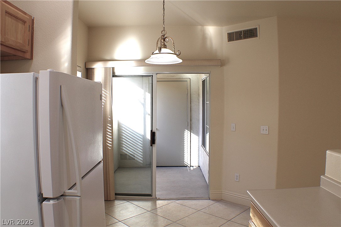 1531 Ruby Cliffs Lane, Unit 102 Las Vegas, NV 89144 - Photo 10 of 30 DINING AREA OFF KITCHEN!