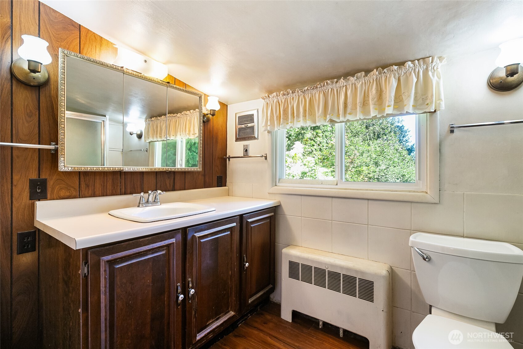 4535 Cable Street Bellingham, WA 98229 - Photo 13 of 31 a bathroom with a sink and a toilet