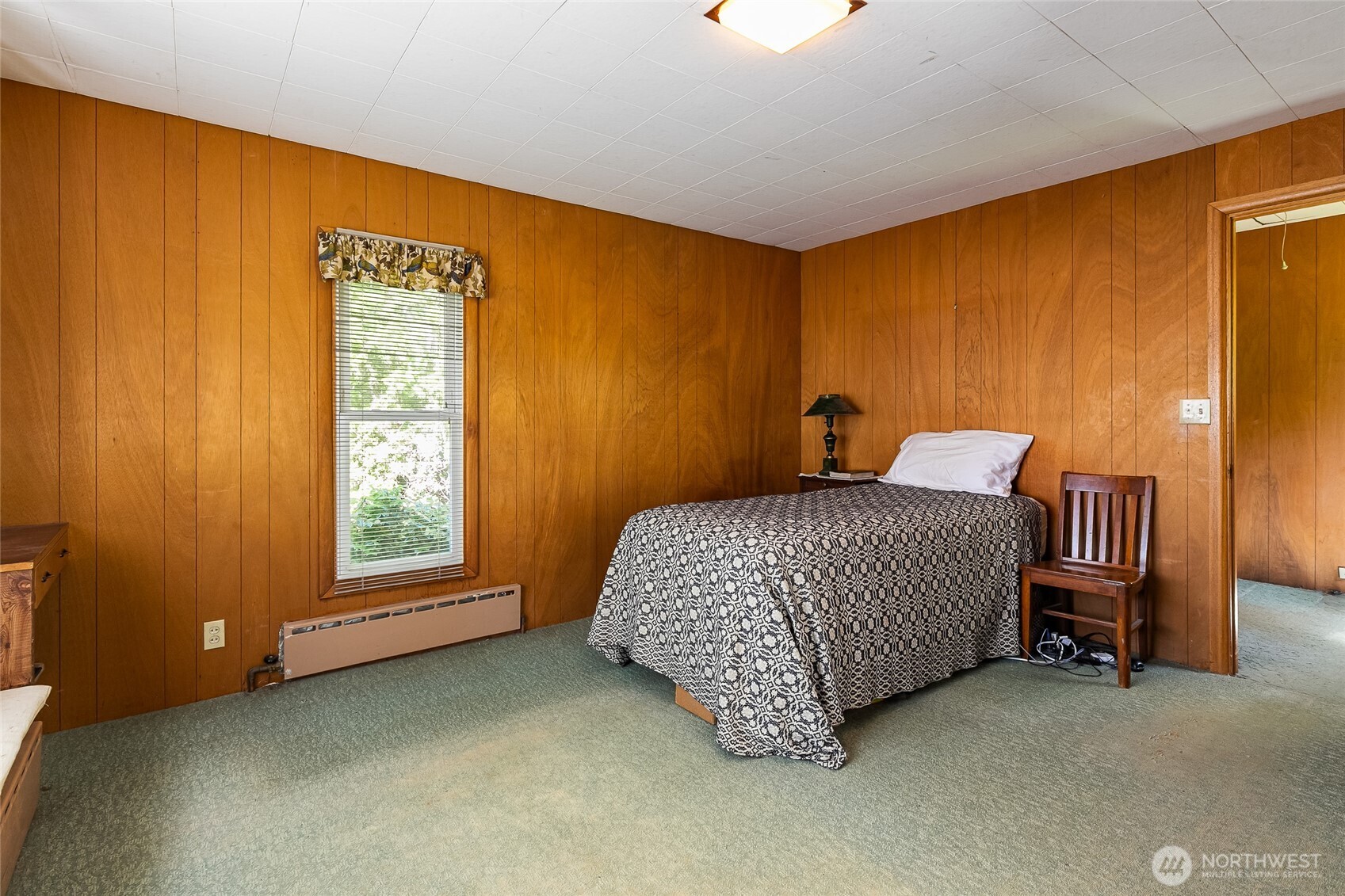 4535 Cable Street Bellingham, WA 98229 - Photo 21 of 31 a bedroom with a bed and a window