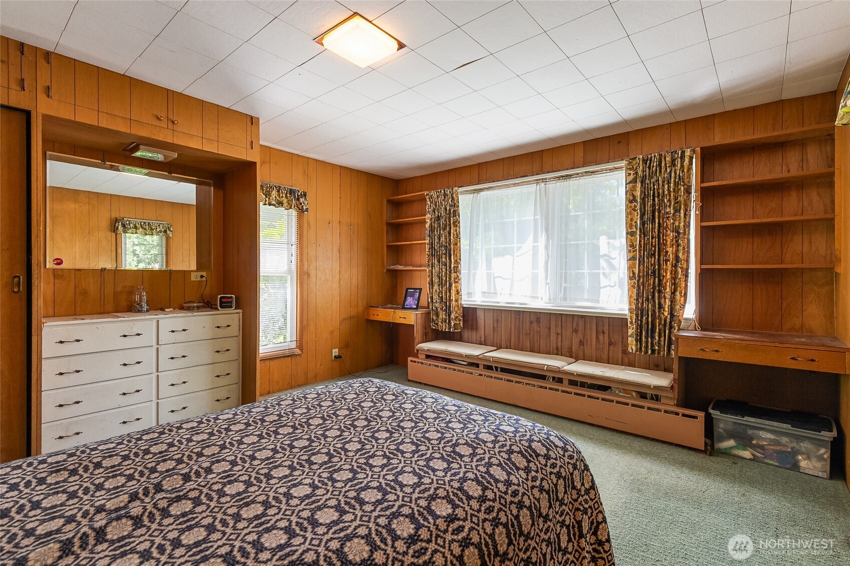 4535 Cable Street Bellingham, WA 98229 - Photo 22 of 31 a bedroom with a bed and a dresser