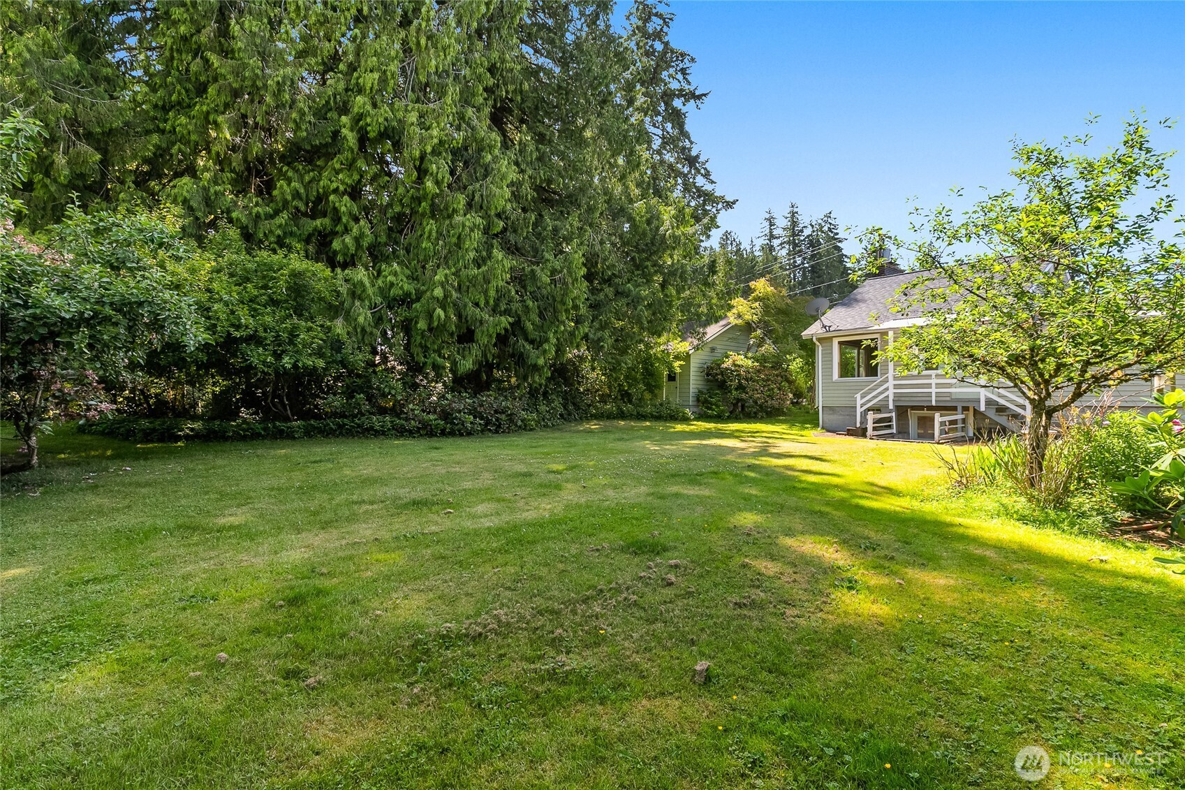 4535 Cable Street Bellingham, WA 98229 - Photo 27 of 31 a view of yard with swimming pool and green space