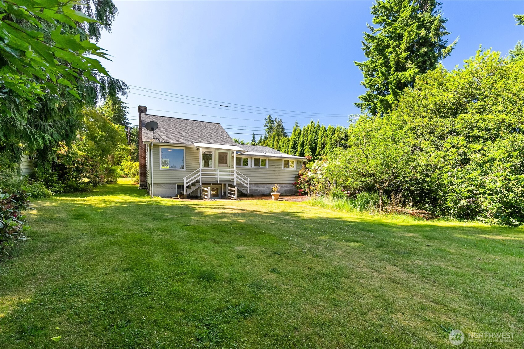 4535 Cable Street Bellingham, WA 98229 - Photo 28 of 31 a view of a house with a big yard