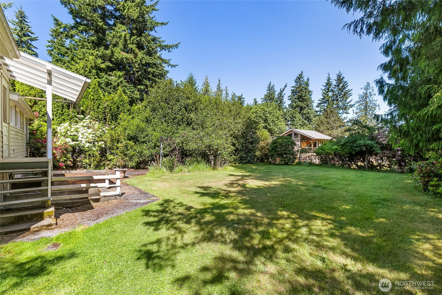 4535 Cable Street Bellingham, WA 98229 - Photo 29 of 31 a view of a garden with lawn chairs