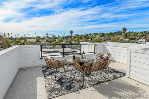 a view of a terrace with furniture
