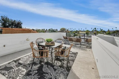 a view of a terrace with furniture