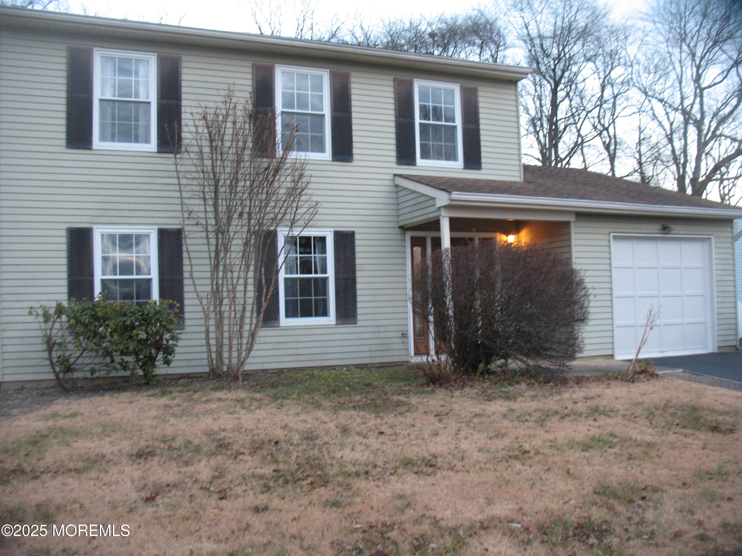 32 Appletree Road Howell, NJ 07731 - Photo 2 of 18 a view of backyard of house