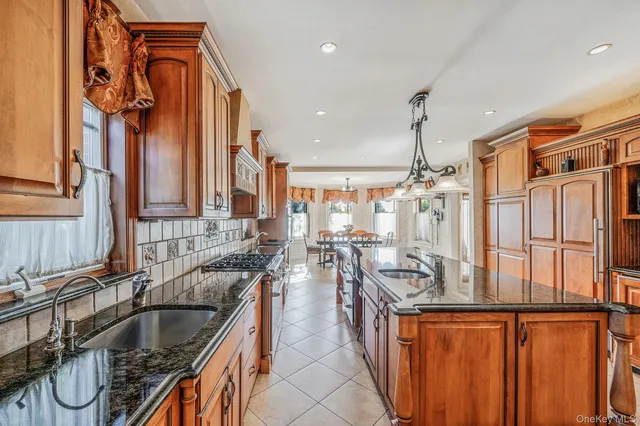 a living room with lots of furniture and white walls