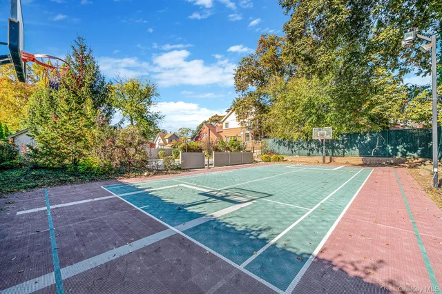 an aerial view of residential house with outdoor space and swimming pool