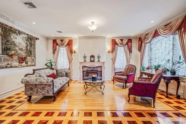 a living room with furniture and a rug